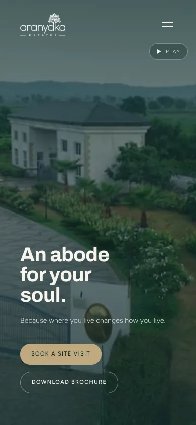 Aranyaka Estates website on a phone